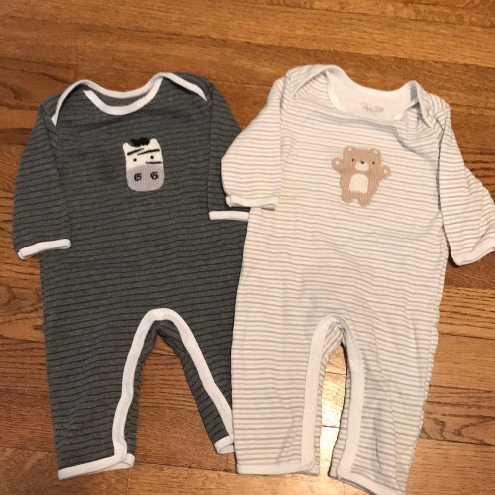 Two one piece boy outfits.